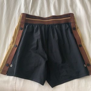 FP movement shorts with buttons on side